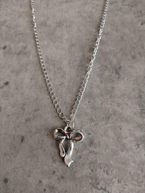 Aura Mini Bow Pendant – A Whisper of Elegance