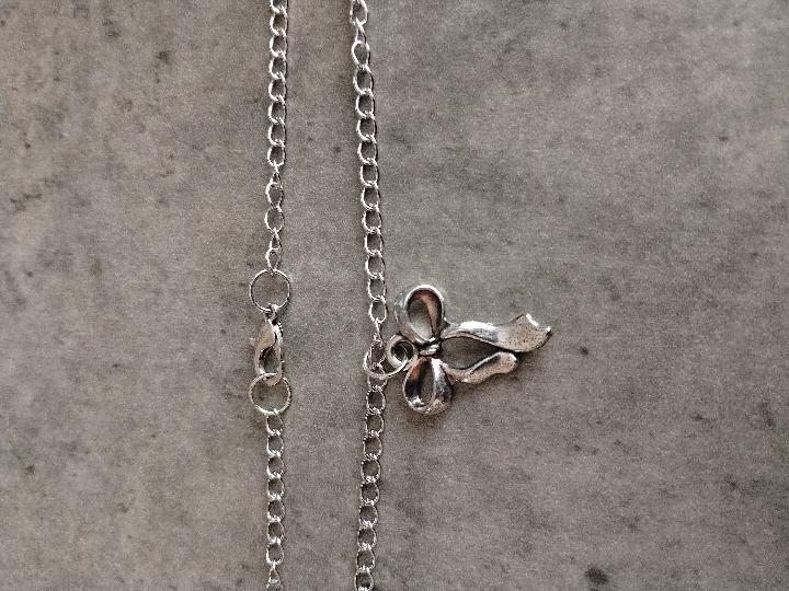 Aura Mini Bow Pendant – A Whisper of Elegance